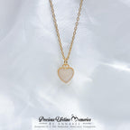Heart-shaped pendant necklace on a white background with 'Precious Lifetime Memories by Annabel' branding.