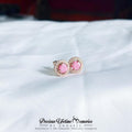 Pink gemstone earrings on a white fabric background with 'Precious Lifetime Memories by Annabel' branding.