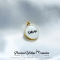 White pendant with 'Celine' engraving on a white background, branded as 'Precious Lifetime Memories by Annabel'.