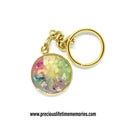 Keychain with a colorful round charm on a white background