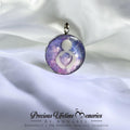 Purple Galaxy pendant with a design on a white fabric background, featuring 'Precious Lifetime Memories by Annabel'.