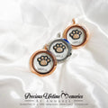 Three circular pendants with paw prints on a white fabric background, featuring 'Precious Lifetime Memories by Annabel'.