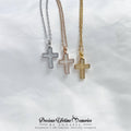 cross-shaped necklaces in silver, rose gold, and gold on a white background with 'Precious Lifetime Memories by Annabel' branding.