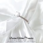 Silver bracelet on a white fabric background with 'Precious Lifetime Memories by Annabel' branding.