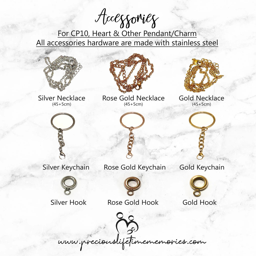 Jewelry accessories including necklaces, keychains, and hooks on a marble background with product names and measurements.