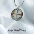 Four-leaf clover pendant necklace on a white satin background with 'Precious Lifetime Memories by Annabel' branding.