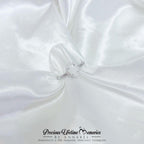 Silver breastmilk Oval ring on a white satin background with 'Precious Lifetime Memories by Annabel' branding.