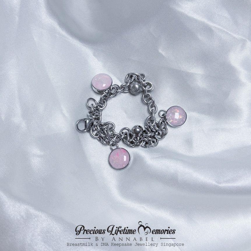 pink breastmilk pendant bracelet